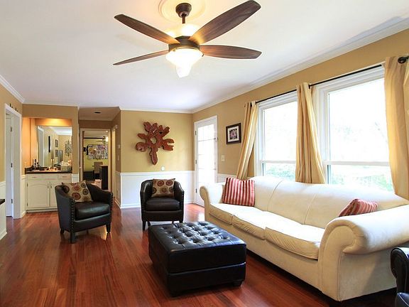 Wet bar in family room & view to kitchen. New Bellawood Brazilian cherry floor