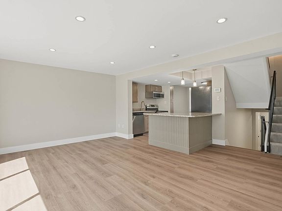 Living Room w/ new LVP, 9ft ceilings