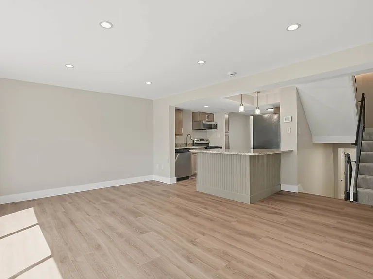 Living Room w/ new LVP, 9ft ceilings