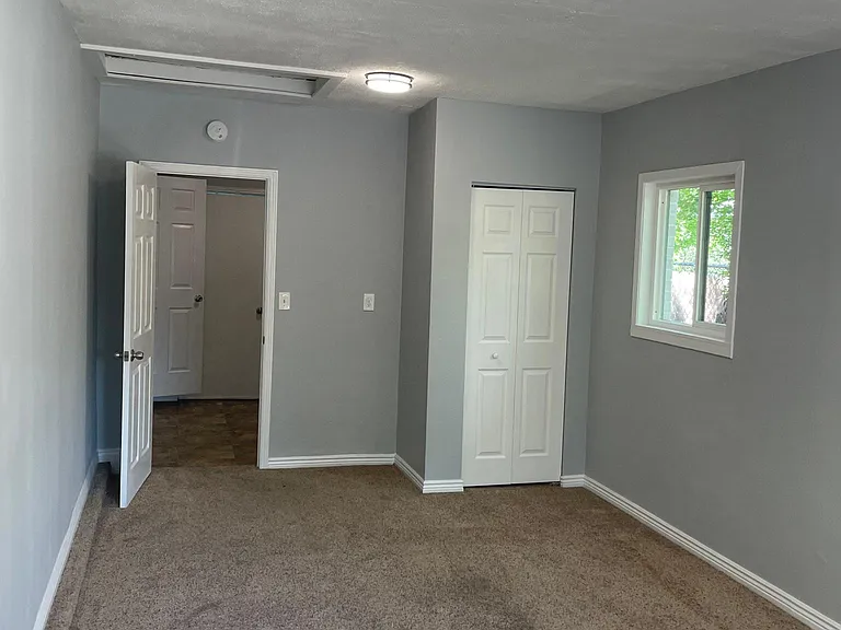 large bedroom off of laundry room
