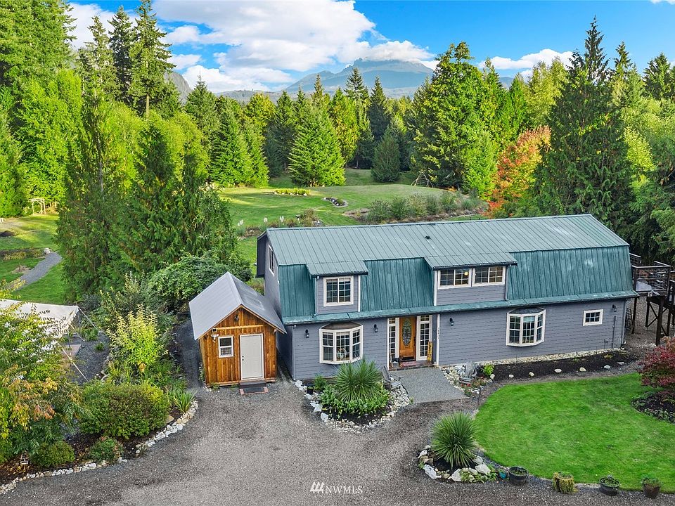 Welcome to this stunning, sun-drenched, just shy 7 acre parcel nestled in Arlington.