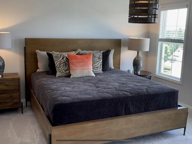 King Master bedroom is spacious with a full walk in closet