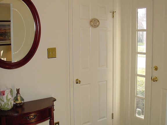 Entry with access to updated powder room. 