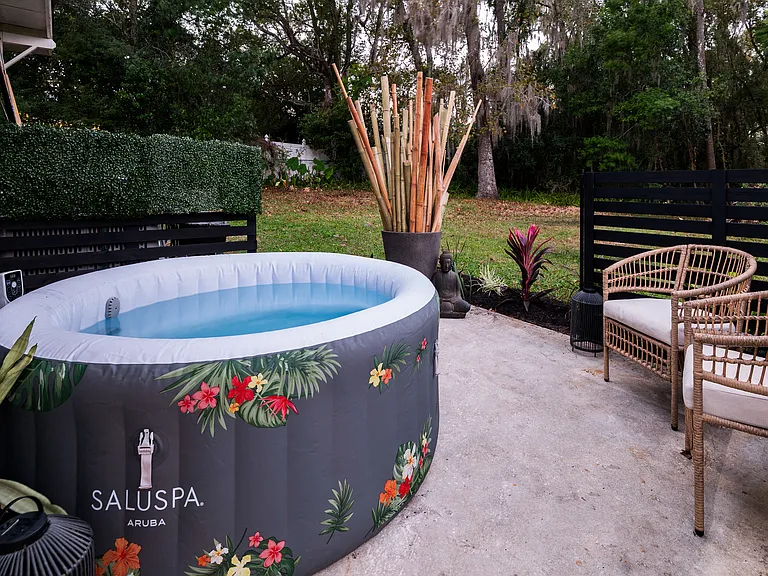 2-3 person hot tub with temperature to 104 degrees.