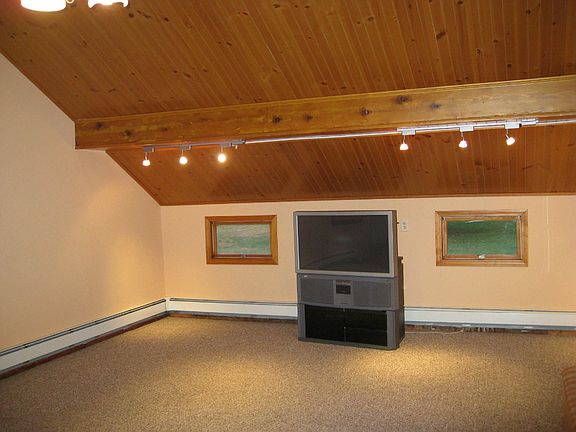 Living room with vaulted ceiling