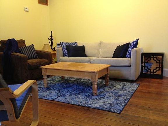 Living Room is light and bright with high ceilings and gas f