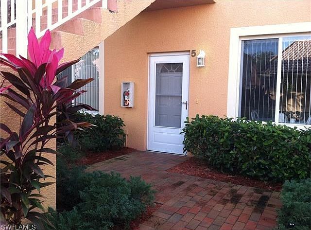 First floor home with landscaped entry