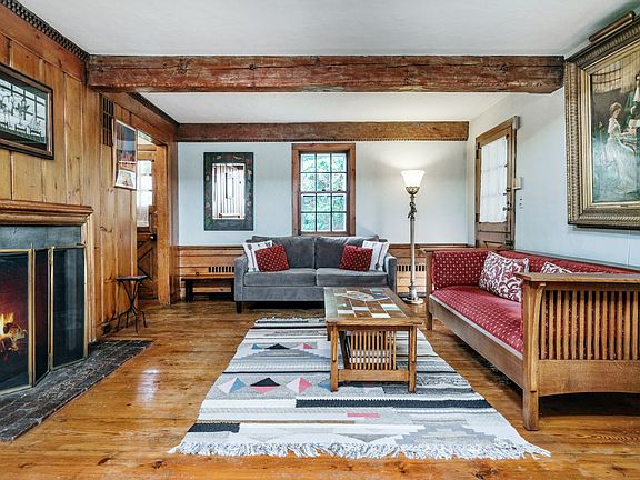 Living room w/ fireplace facing front door