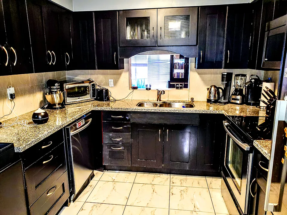 Kitchen with Granite Countertops and Stainless steel Appliances