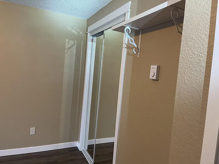 Larger of the two bedrooms