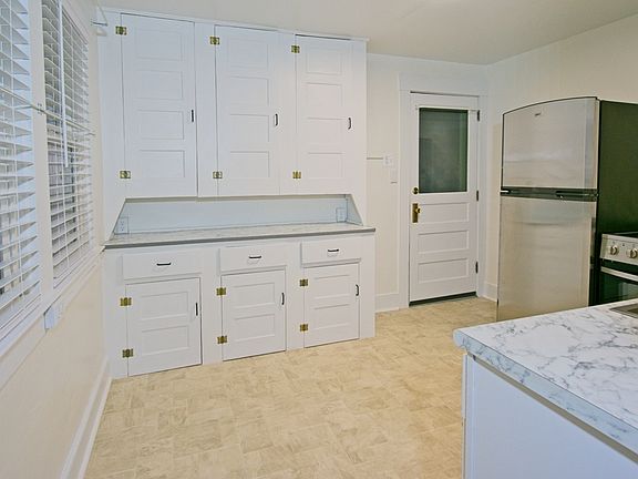 Kitchen viewed from doorway to dining room.