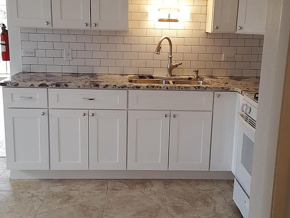 New kitchen cabinets, granite countertops, undermount sink