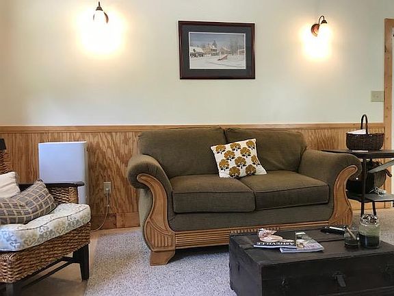 Photos w/ previous renters furniture.