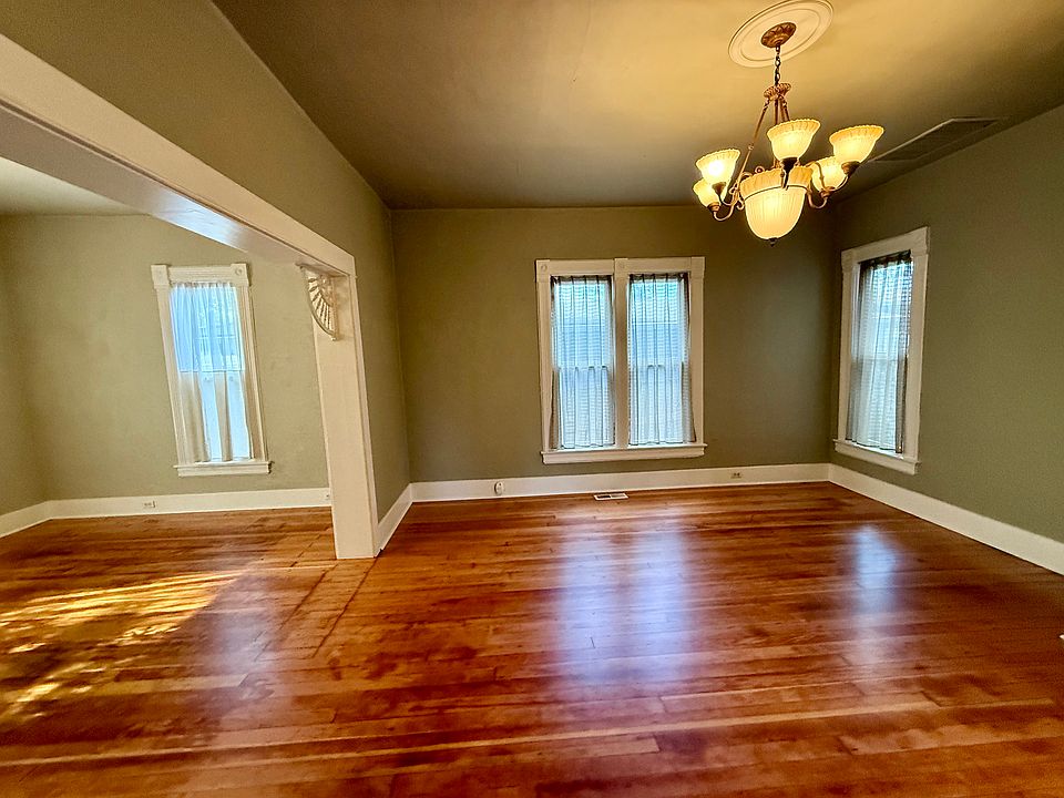 Living & dining space. Newly refinished hardwood floors