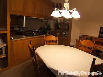 Seeing two levels at once, windows past
						:
						Upstairs FP, loft over. Builtin TV area: cable ,electrical, spotlight, bay left