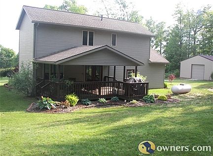 Beautiful covered back deck over looking woods