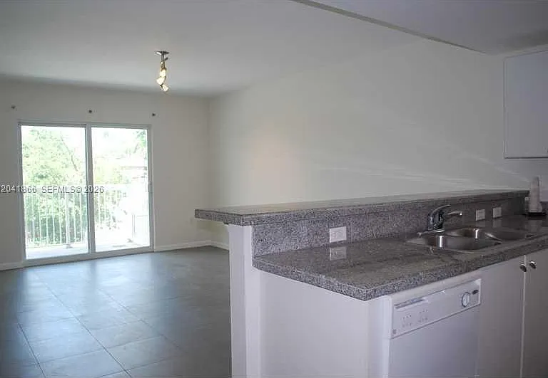 2740 SW 28th Ter #207 — Photo 1