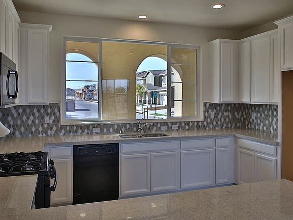 Kitchen with white cabinets