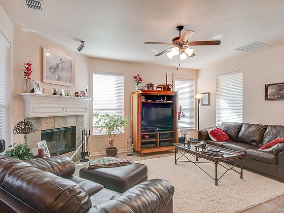 Living area with wood burning fireplace
