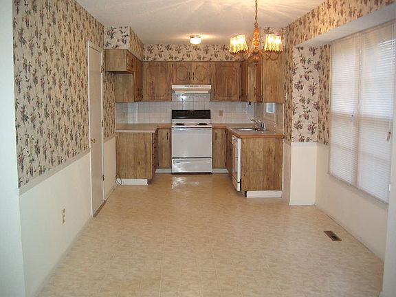 Kitchen w/ Dishwasher & Stove