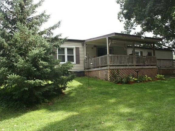 View of the back showing the large covered deck.