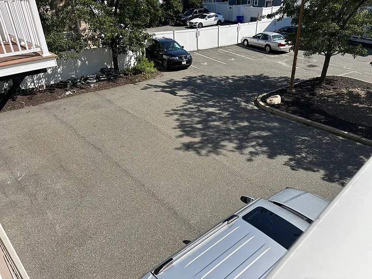 2 dedicated parking spaces plus 5 visitor spaces.