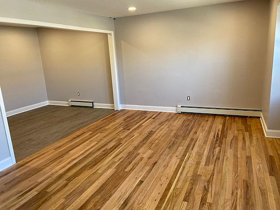open concept living dining kitchen
