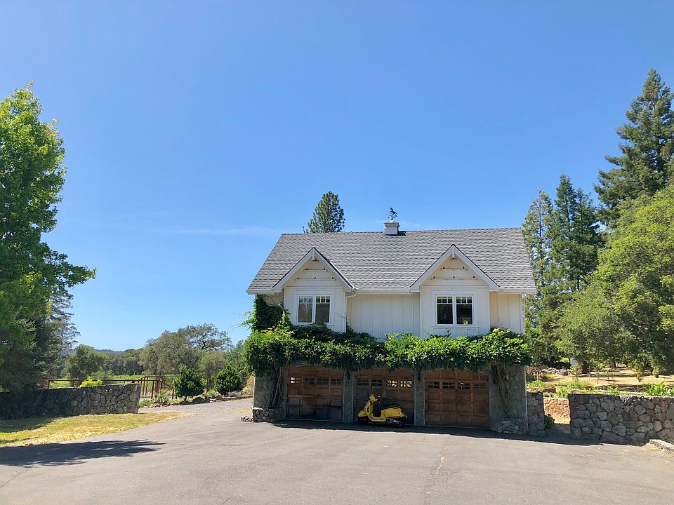 cottage is above the garage. Right most garage belongs to the cottage. Laundry is inside. Tesla charger is available but then electrical bill is not included in the price.