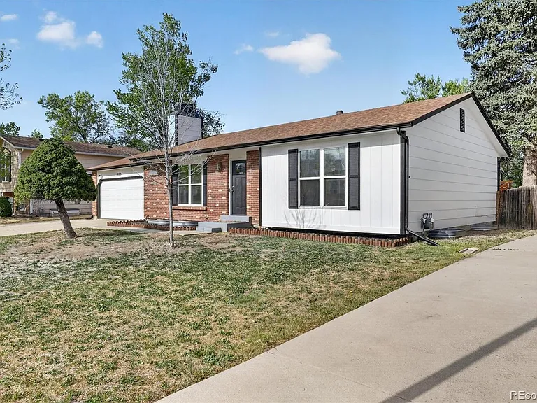 9334 Bellaire St — Photo 1