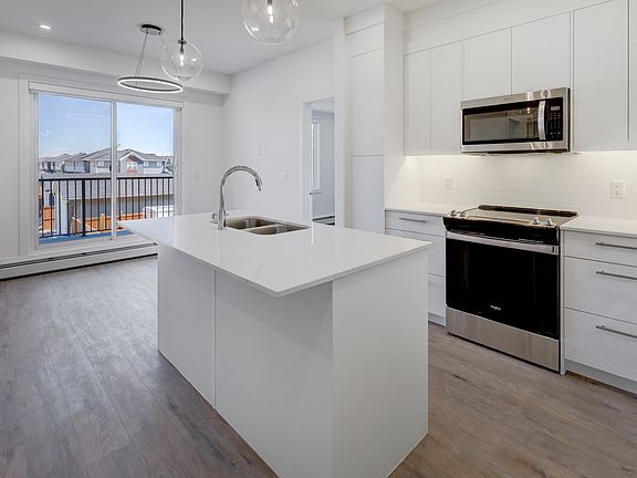 2nd image of 265 Wolf Willow Blvd SE #1208