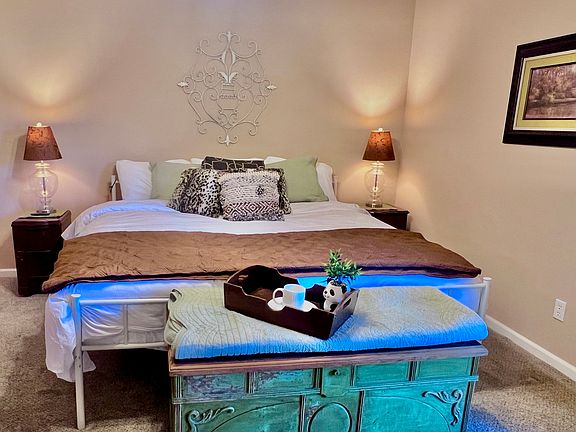 PRIMARY BEDROOM WITH KING BED