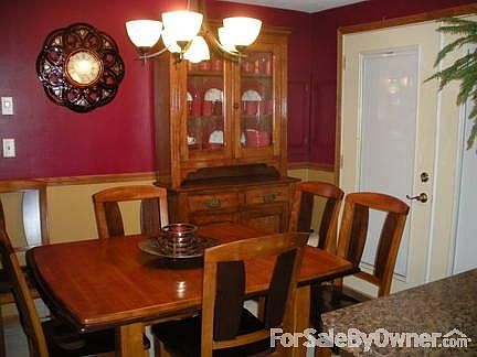 Dining Area
						:
						New Patio Doors with blinds inside the glass lead out to the 20x20 patio.