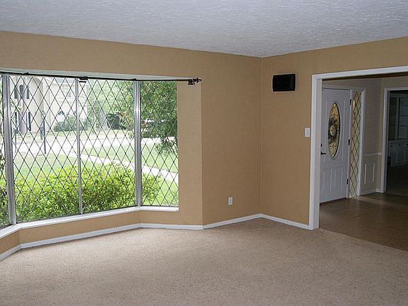 REPLACED CARPETS, BAY WINDOWS ALLOW THE OUTDOORS INSIDE