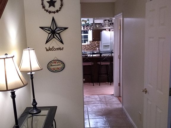 Foyer with custom tile work