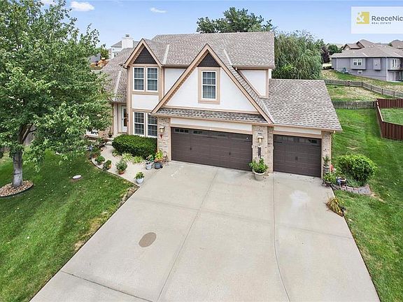 This great home has a newer roof, newer garage doors with a huge wide 3 car driveway.