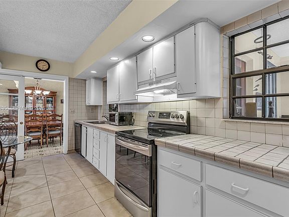 4th image of 5660 W 13th Ct