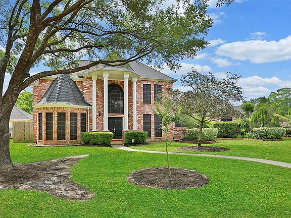Mature trees and landscaping in place. Solar screens on windows.