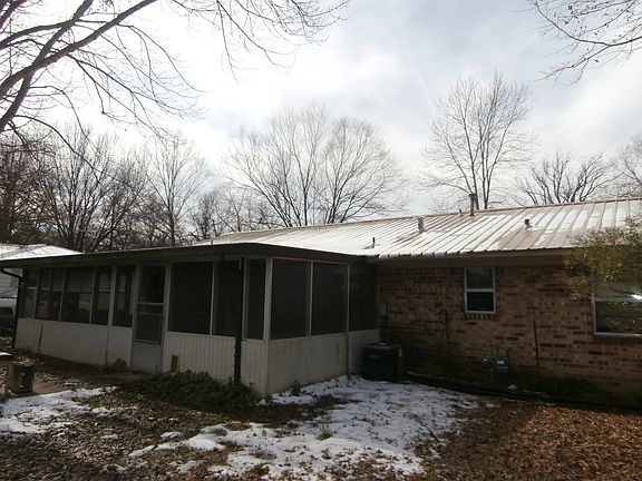 Back of home with sunporch