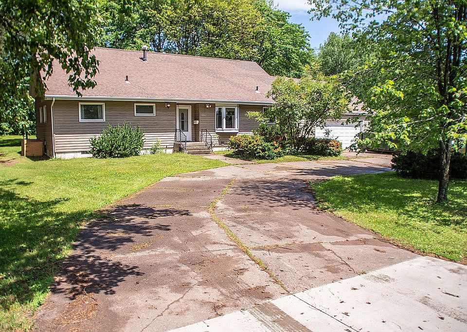 Front with circle driveway