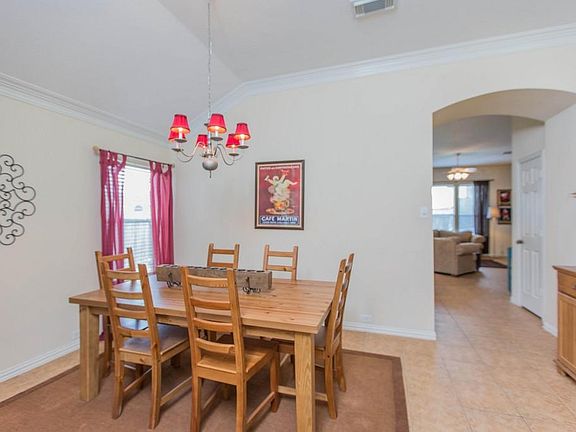 From the front entryway looking at your dining room and down hallway to the living room.