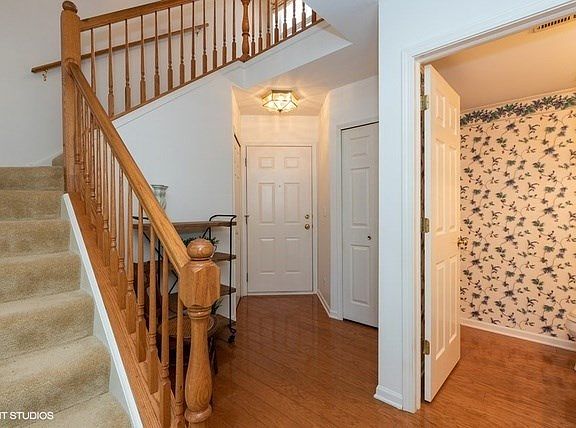 Cute foyer with extra storage.