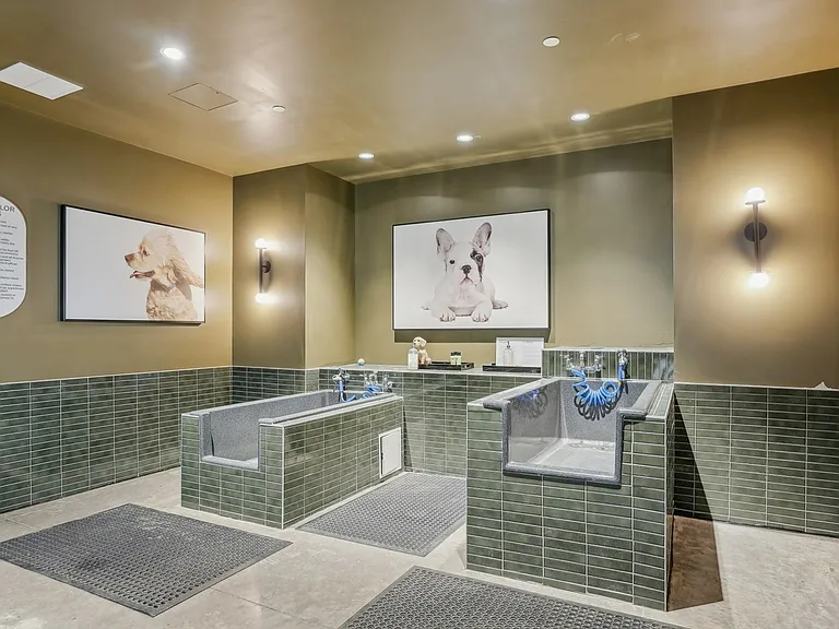 Pamper your pet at our stylish grooming spa, complete with wash stations and everything you need to keep them fresh and clean.
