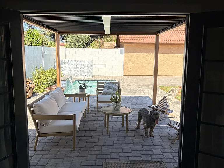 View from inside detached office with both French doors open.