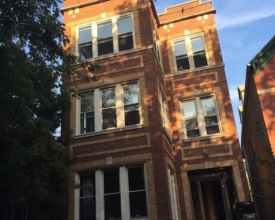 exterior of brick three-flat