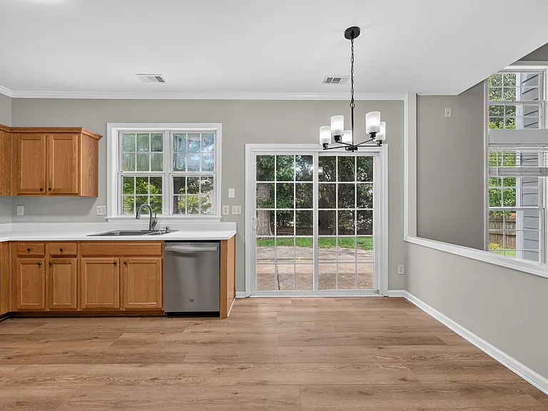 Kitchen open to backyard