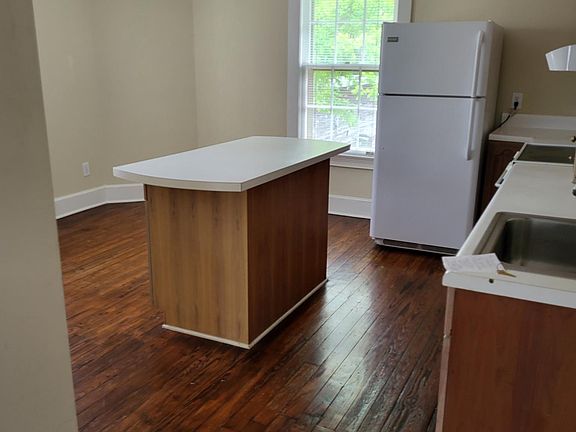 Unit E Kitchen Island, original hardwood floors
