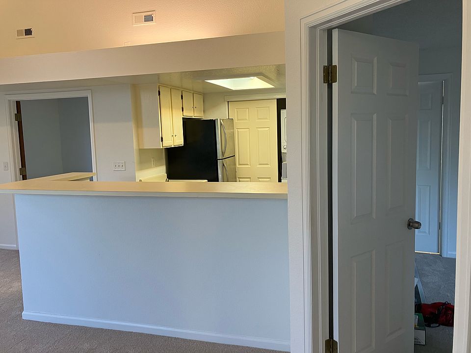 Another view from entrance. Rooms from left to right are second bedroom, kitchen, and first bedroom.