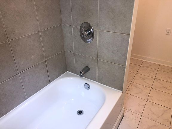 New stone tile in bathroom