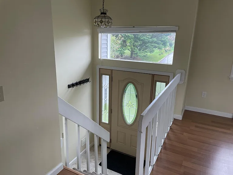 Front door entryway and stairs