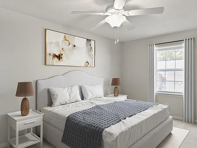 Experience relaxation in this elegantly designed bedroom, complete with modern amenities.